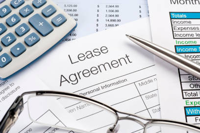 Close up of lease agreement form representing a decision to sign a commercial lease in Manhattan