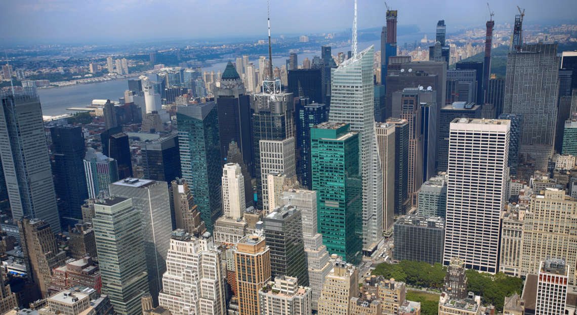 Panoramic Manhattan skyline view from Empire State, NYC.