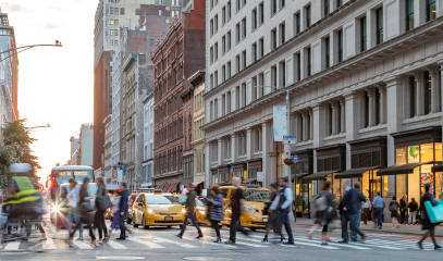 Busy Broadway intersection in Manhattan, top NYC commercial real estate district.
