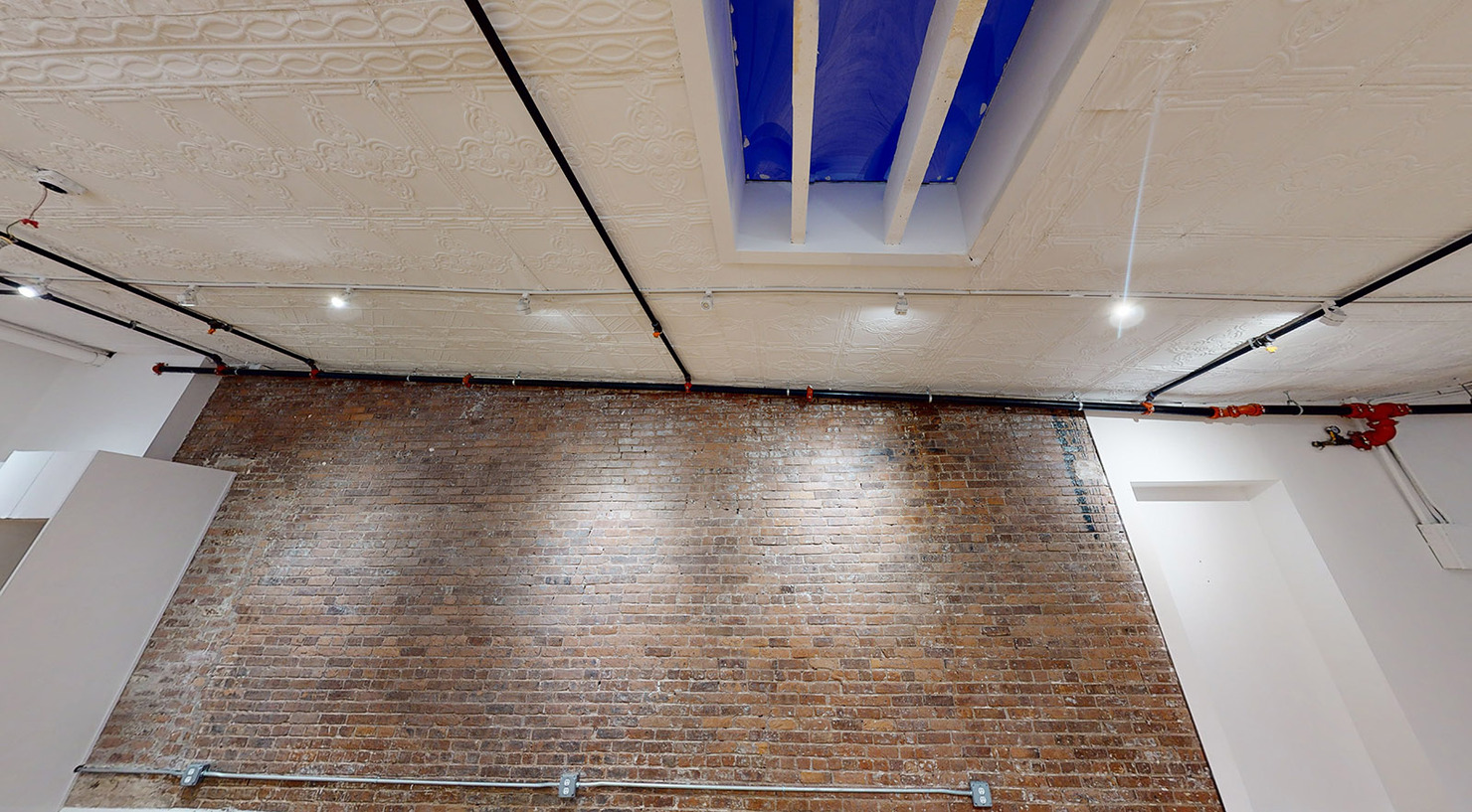 39 West 14th Street Office Space - Brick Wall & Skylight