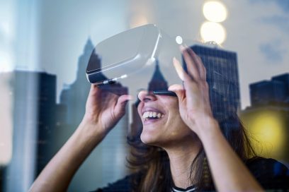A young woman using VR technology, explores the emerging virtual NYC real estate market.