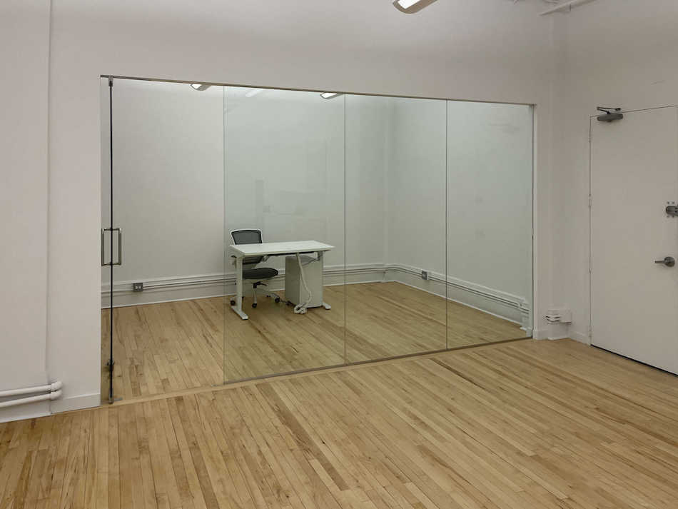 Bright 1,456 sq ft loft office for lease at 584 Broadway, in a well-maintained Class B building.