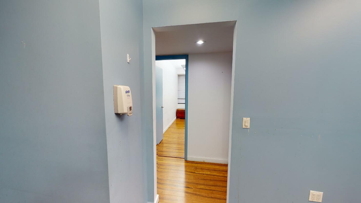 369 Lexington Avenue Office Space - Light Blue Walls and Hardwood Floor